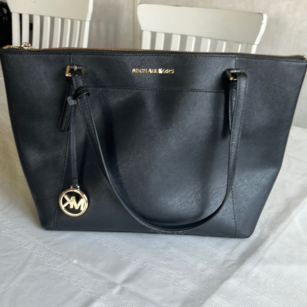 Michael Kors black tote bag.
